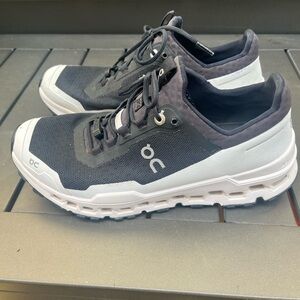 On Running Black and White Athletic Shoes